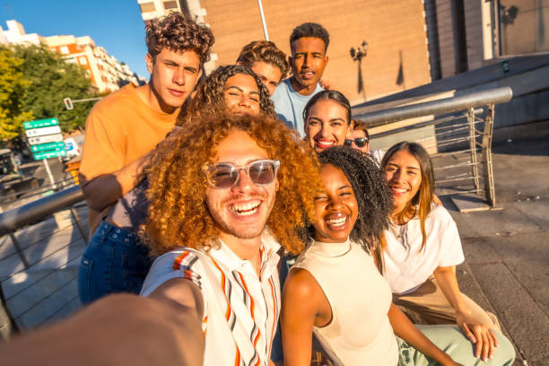 istock Group of students taking a selfie outdoors in the city 2197761420