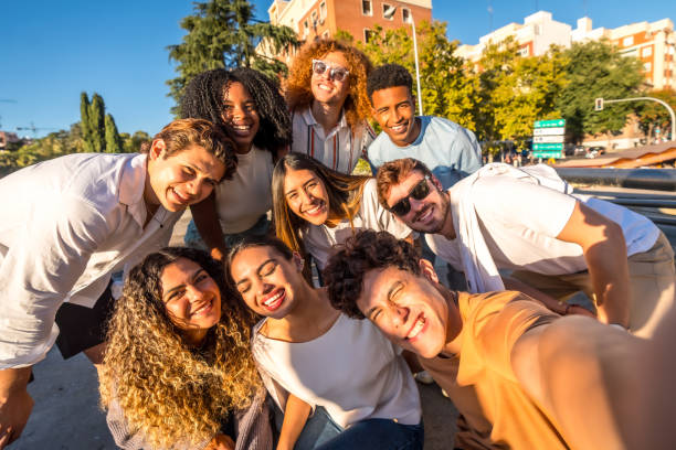istock Happy multi-ethnic friends taking a selfie outdoors in the city 2197761443