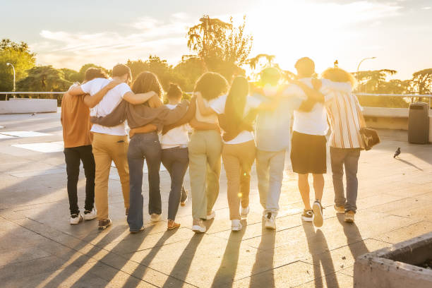 istock Group of students walking together at sunset: embracing friendship and unity 2197762044