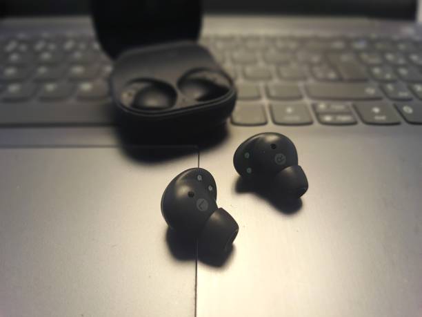 istock Wireless headphones on laptop 2197769767