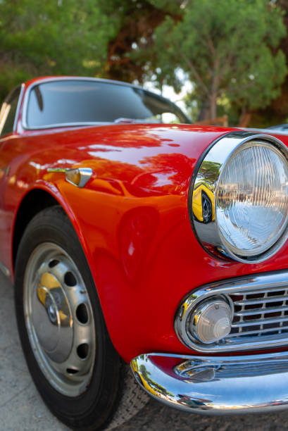 istock Red classic car in the park. 2197778495