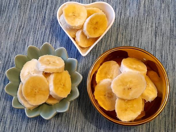 istock Slices of banana in bowl 2197780376