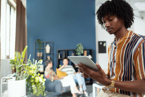 istock Portrait of a modern young man using tablet at his office 2197780703