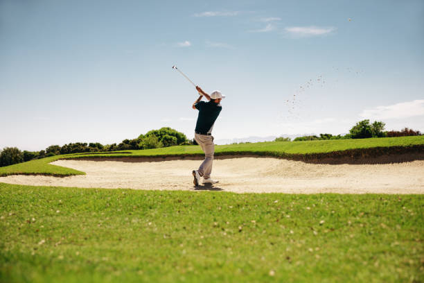 istock Male golfer in a stance showcasing a powerful swing 2197781817