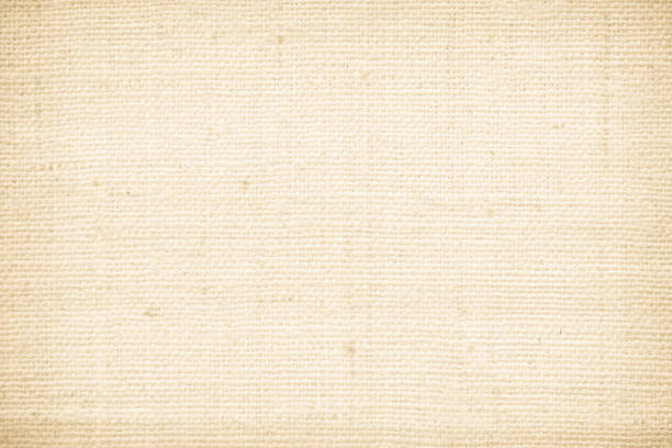 istock Brown sackcloth woven texture background in natural pattern. Jute hessian burlap, linen background in light beige cream color blank. Weaving canvas fiber line cotton cloth textured as organic. 2197782579