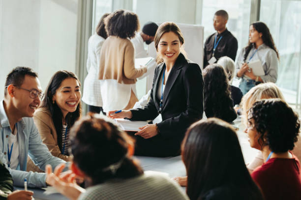 istock Diverse business team collaborates on strategy in a modern office environment with teamwork and innovation at the forefront 2197784019