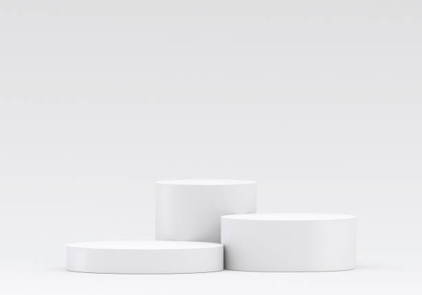 istock White product display podium in studio room, for display presentation 2197784133