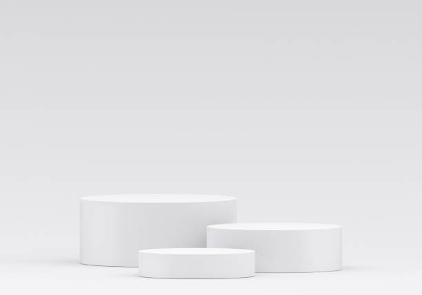 istock White product display podium in studio room, for display presentation 2197784161