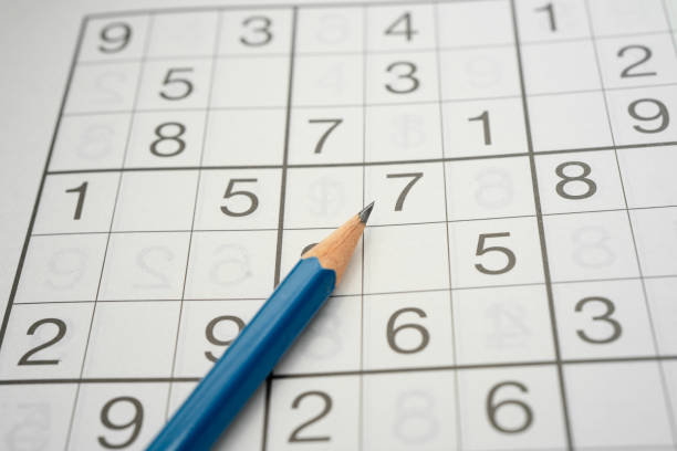 istock Sudoku puzzle, game to keep you brain younger for developing Alzheimer disease in senior patient. 2197789273