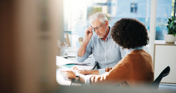 istock Small business, team and manager in discussion for shipping, logistics paperwork and training in office. Talk, distribution and people planning delivery for ecommerce, schedule or supply chain stock 2197790589
