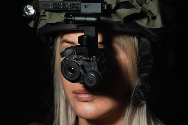 istock Girl in tactical helmet with thermal monocular (night vision). 2197790769