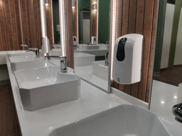 istock Automatic liquid soap dispenser in public toilet 2197791195