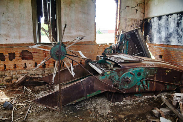 Abandoned machinery in a derelict Auburn building, Indiana, reflecting industrial decay and the passage of time.