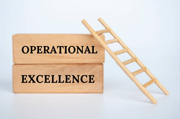 istock Operational Excellence text on wooden blocks with small ladder background. Business concept 2197799820