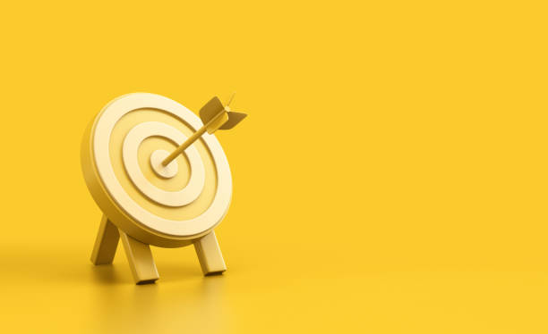 istock Yellow Target with Arrow Hitting the Bullseye 2197800096