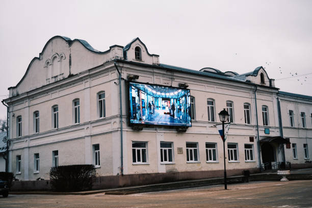 Mosalsk, Russia - February 5, 2025: Building with TV panel in the center of Mosalsk