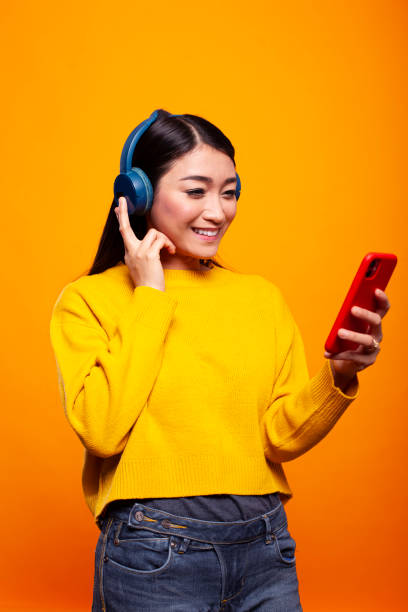 istock Woman with headphones on a video call 2197812322