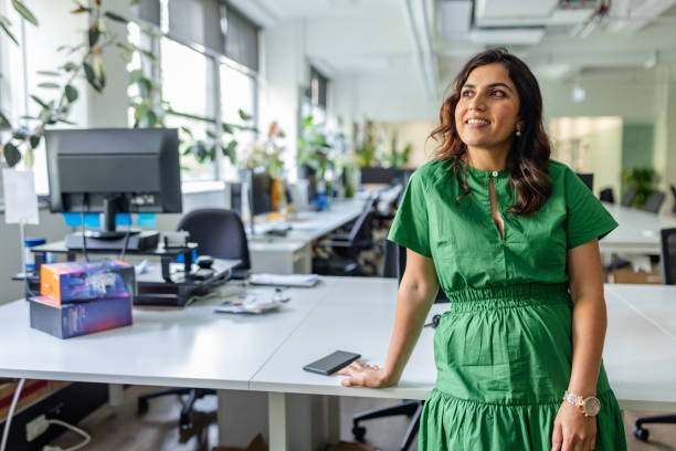 istock Bright and modern office setting in Sydney showcasing innovative workspace design and a confident individual engaging in creative thought 2197813582