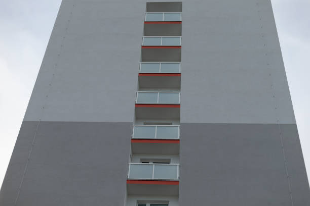 istock A tall and impressive building featuring numerous windows and balconies 2197816858