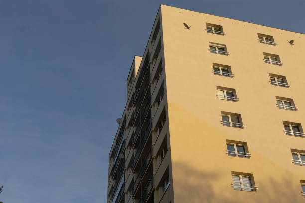 istock A HighRise Apartment Building Against A Bright Blue Sky Background 2197818641