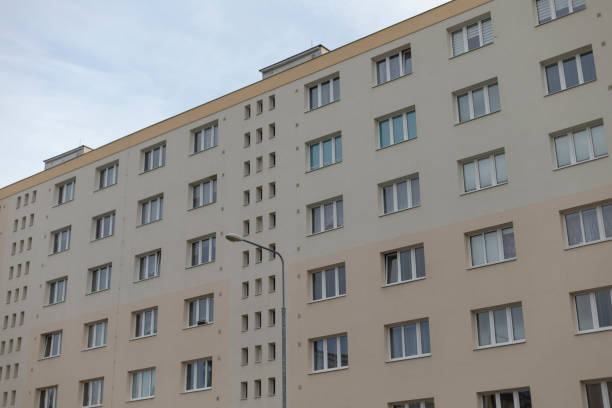istock A large building with many windows and a street light in front 2197819274
