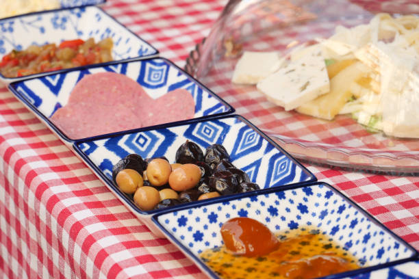 istock Distinctive, beautifully presented appetizers in decorative bowls on a checkered tablecloth 2197819967
