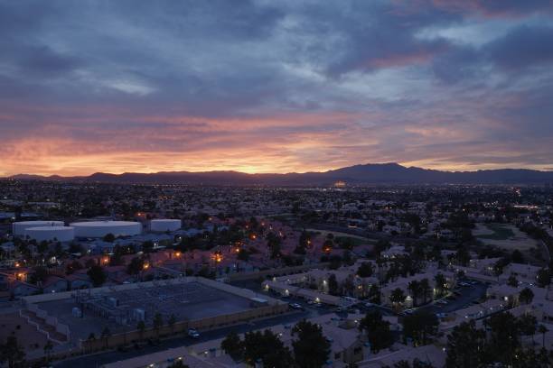Evening shot of Las Vegas hotels and casinos with palm trees in the foreground