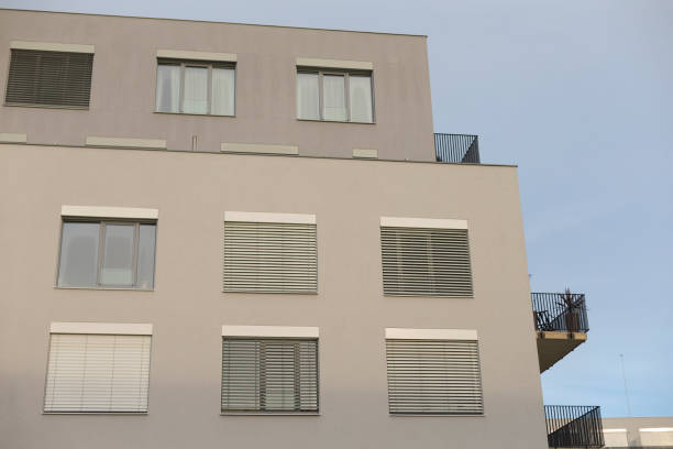 istock A tall building that features a balcony located at its upper section 2197826045