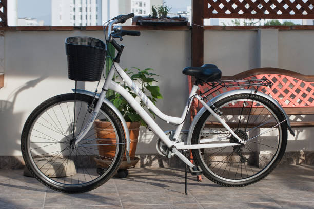 istock White bicycle, with black basket, isolated 2197827175