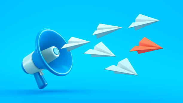 istock Blue Megaphone with Flying Paper Planes Representing Communication and Leadership 2197832347
