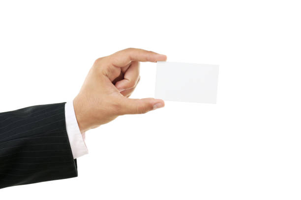 istock Businessman holding blank card in his hand on white background 2197832547
