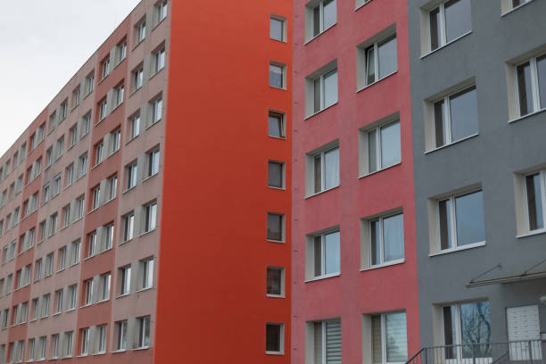 istock A tall red and gray building featuring a multitude of windows 2197834437