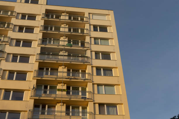 istock There is a very tall building featuring numerous windows and many balconies 2197834510
