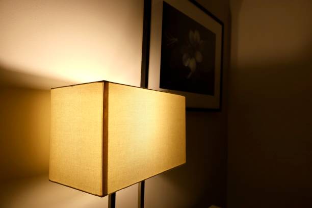 istock a luminous lamp with a rectangular lampshade near the wall 2197834533