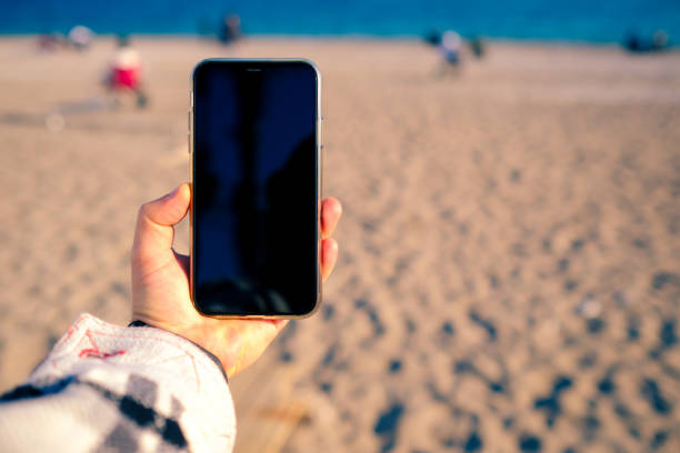 istock Smartphone screen and sea in close-up 2197834632