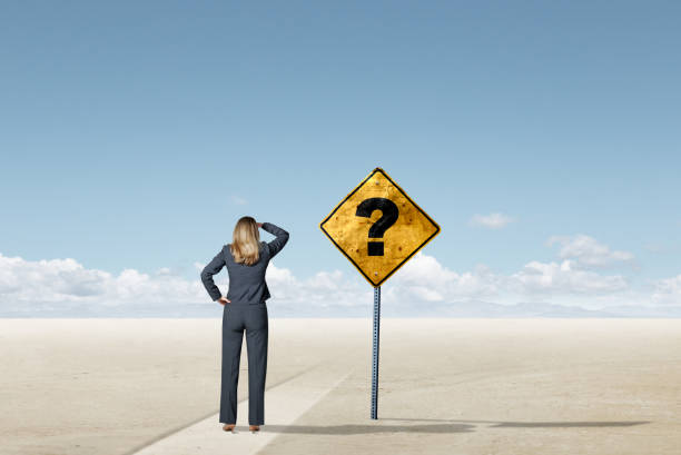 istock Woman Looks Down Disappearing Path 2197839313