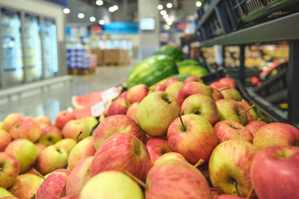 istock Granadilla and apple on display in a wholesale supermarket 2197839774