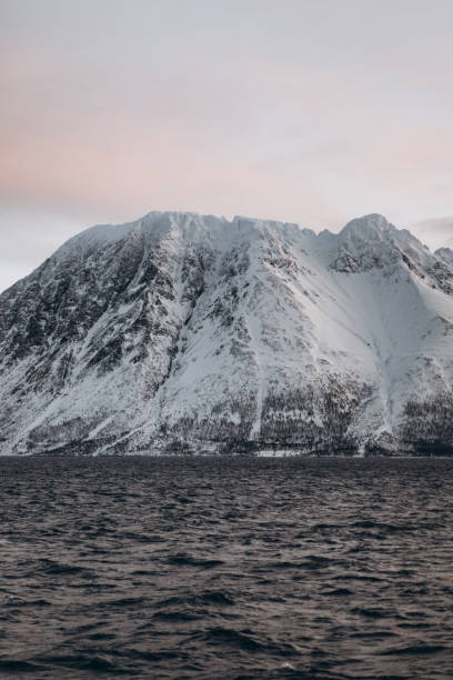 istock Snowy Mountain by the Sea 2197839840