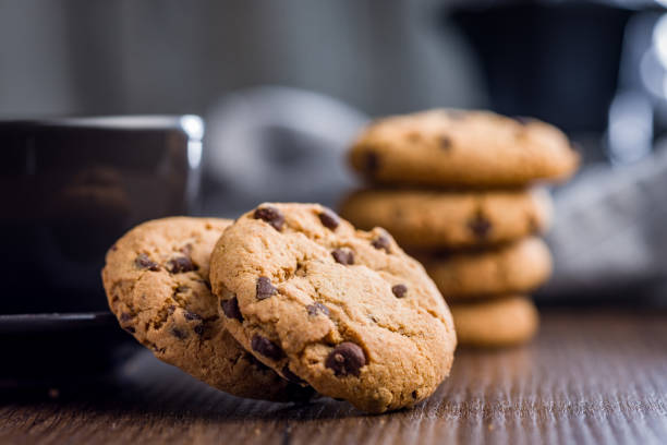 istock Chocolate chip cookies on wooden table. 2197840354