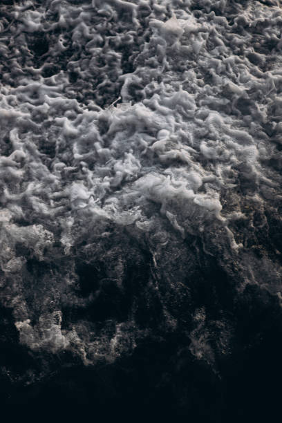 istock Frothy Waves in Dark Ocean Depths 2197841569