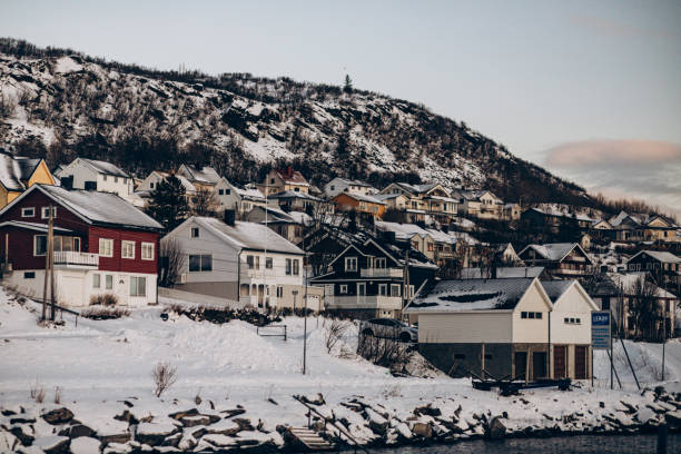 istock Charming Coastal Village in a Snowy Landscape 2197842021