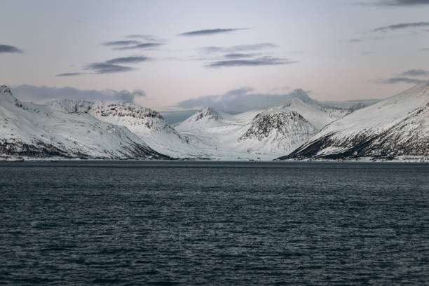 istock Snowy Mountains and Calm Water at Twilight 2197842057
