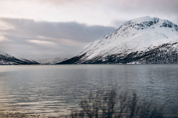 istock Winter's Quiet Majesty: Mountain and Lake 2197842073