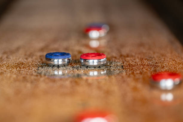 istock Playing a game of shuffleboard.. 2197842407
