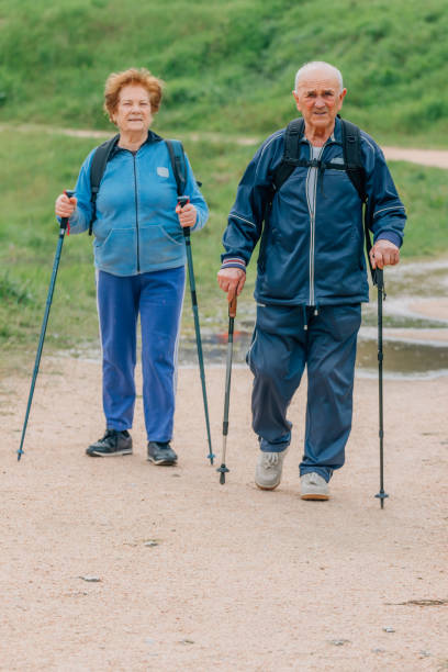 istock senior couple hiking outdoors in nature 2197843780