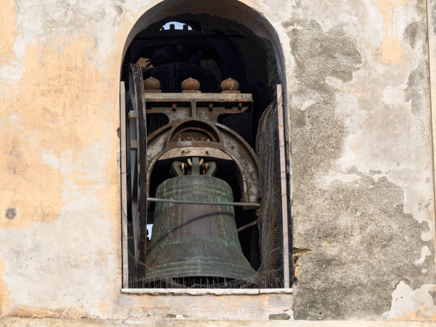 istock Ancestral bell tower and bell in old church 2197845661