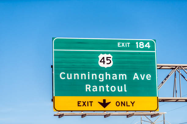 Urbana, Illinois highway interstate road with sign text for Cunningham avenue Ratoul exit 184 only