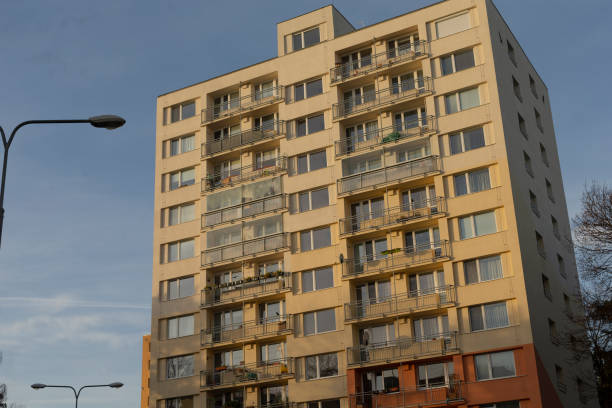 istock A very tall building that features numerous windows and several balconies 2197857578