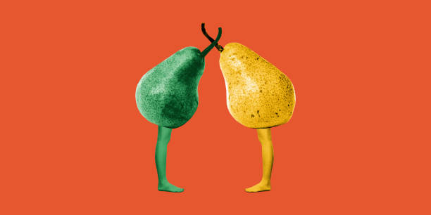 istock Minimalistic absurd collage. Two pears with human legs stand face to face against orange background, symbolizing, unity and balance 2197861081