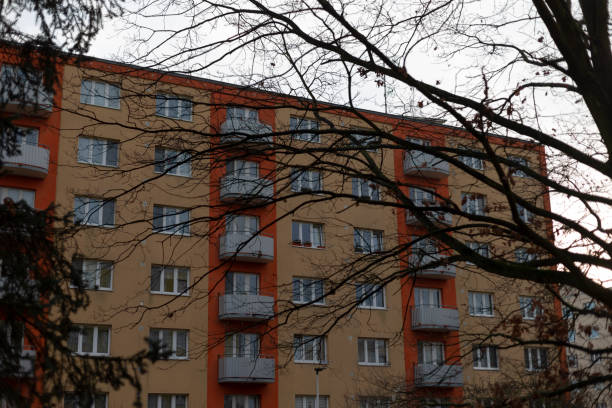 istock An apartment building has trees elegantly placed in the background 2197872016